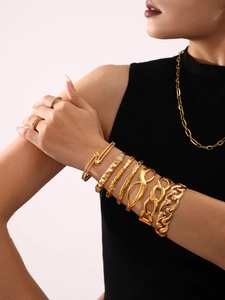 Detailed layered styling of 18K gold plated titanium steel bracelets and chain jewelry