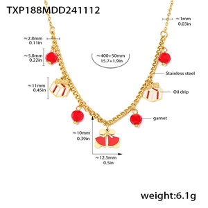 Detail of Christmas necklace showing red gift box charm and bell with 450mm chain length
