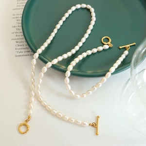 Baroque freshwater pearl necklace and bracelet set with golden OT buckle closure