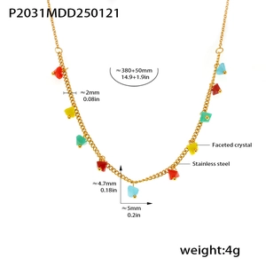 Detailed view of bohemian gold stainless steel necklace with faceted colorful crystals