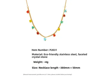 Close-up of golden stainless steel necklace with multi-color faceted crystal stones