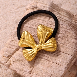 Élastique à cheveux avec nœud doré plaqué or 18 carats sur cordon noir robuste