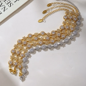 Set of 18K gold-plated stainless steel bracelets featuring 5A cubic zirconia flower charms