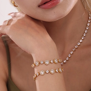 Luxury gold-plated titanium steel bracelet with 5A cubic zirconia halo setting for women