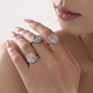 Set of three silver bohemian rings with moon, star, and evil eye motifs and colorful zircon