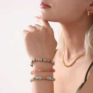Three-piece set of natural stone bead bracelets with 18k gold plated stainless steel accents