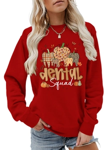 Close-up of red crewneck sweatshirt with Dental Squad tooth graphic for Halloween