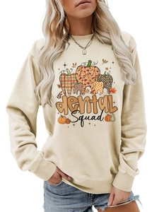 Detail of Dental Squad graphic on comfortable beige round neck sweatshirt for women