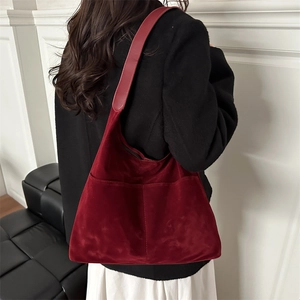 Minimalist deep burgundy frosted leather tote bag shown from a back-view perspective