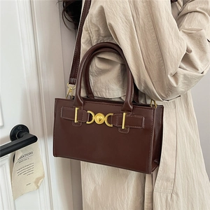 Vintage dark brown crossbody square bag with golden heart buckle and top handle strap