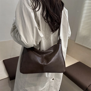 Retro dark brown PU leather tote bag with elegant vertical stitching and gold zipper