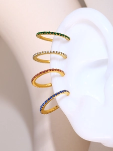 Detail of four-color zircon-inlaid non-piercing C-shaped cuff earrings on ear model