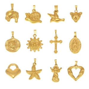 Set of twelve gold plated stainless steel ocean and religious themed charms and pendants