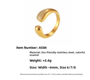 Detailed close-up of 18k gold plated stainless steel teardrop ring with enamel inlay