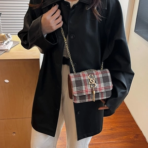 Chic vintage plaid crossbody bag with gold metal chain and tassel decoration