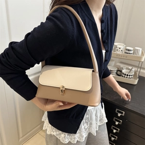 Chic beige and khaki two-tone faux leather underarm bag with gold metal clasp for women