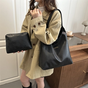 Fashion black leather tote bag set including a large shoulder bag and small zipper pouch