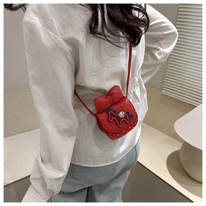 Girl's red quilted crossbody bag with large bow and cute horse embroidery detail