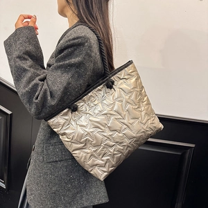 Metallic champagne gold tote bag with star quilting and woven handles for women