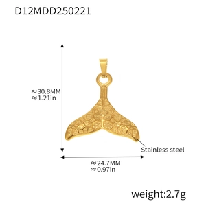 Detailed view of golden stainless steel whale tail pendant with size dimensions