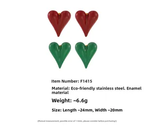 Detailed view of red and green enamel heart earrings with stainless steel dimensions