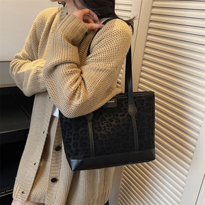 Retro leopard print tote bag in matte suede texture with black leather handles and trim
