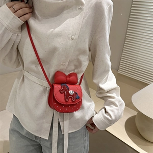 Red girls mini crossbody bag with horse embroidery and large bow detail for New Year