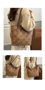 Detail view of brown monogram tote bag with gold metal tag and M-pattern print
