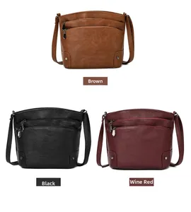 Detailed comparison of brown, black, and wine red bucket bags with pebble leather texture