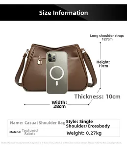 Brown leather tote bag size guide showing 28cm width and 127cm adjustable strap