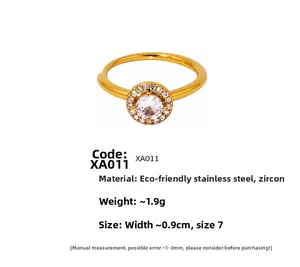 Detail of golden stainless steel ring with zircon insets showing dimensions and weight