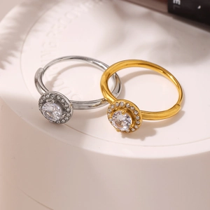 Elegant 18K gold and silver plated stainless steel halo zircon rings on display stand