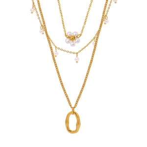 French elegant double layer gold necklace with pearl tassels and irregular oval pendant