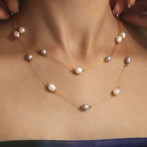 Double-layered gold chain necklace with white and silver-grey baroque pearls for women