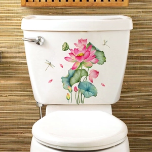 Waterproof lotus and dragonfly wall decals applied to a white ceramic toilet tank