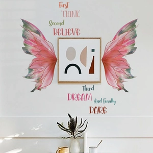 Detail of pink butterfly wings wall decals with colorful motivational English quotes