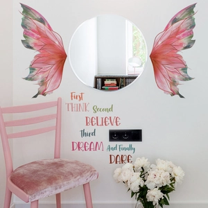 Pink butterfly wall stickers with inspirational quote on white wall near a mirror