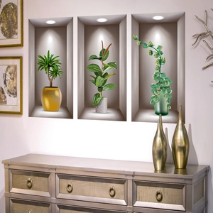 Detalle de vinilos de pared 3D con plantas tropicales y efecto de iluminación de nicho