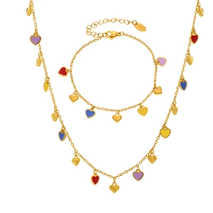 Golden stainless steel jewelry set featuring colorful enamel heart pendants and tassels