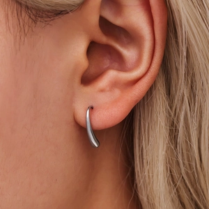 Minimalist silver water drop earrings with a polished mirror finish for a modern look