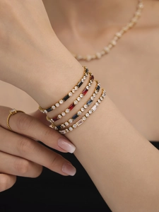 Detail of square-cut colorful zircon tennis bracelets in gold-plated stainless steel