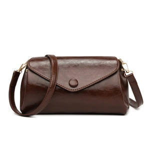 Minimalist vintage dark brown crossbody bag in polished oil-wax leather with gold hardware
