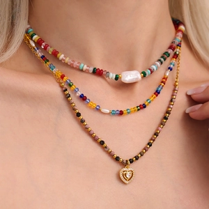Three-layer bohemian style necklace with colored beads, baroque pearl and heart pendant