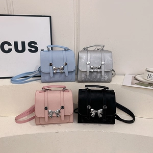 Chic mini square backpack handbag for women in blue, silver, pink, and black colors