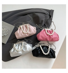 Collection of ruched cloud bags with pearl handles and chain straps in four vibrant colors