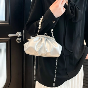 Silver metallic pleated cloud bag with pearl handle and metal chain shoulder strap