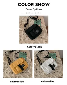 Three colors of minimalist canvas messenger bags in black, yellow, and white with flap buckle