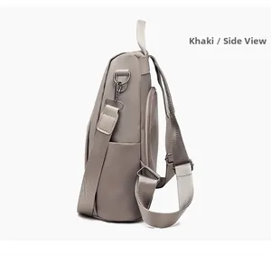 Side view of khaki nylon backpack featuring adjustable straps and functional side pocket