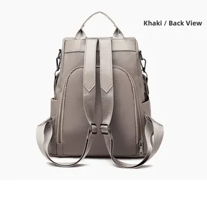 Rear view of khaki waterproof nylon backpack with hidden zipper and wide straps