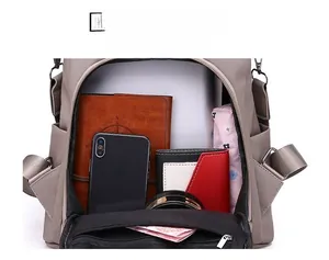 Spacious main compartment of waterproof nylon backpack holding a tablet and daily essentials